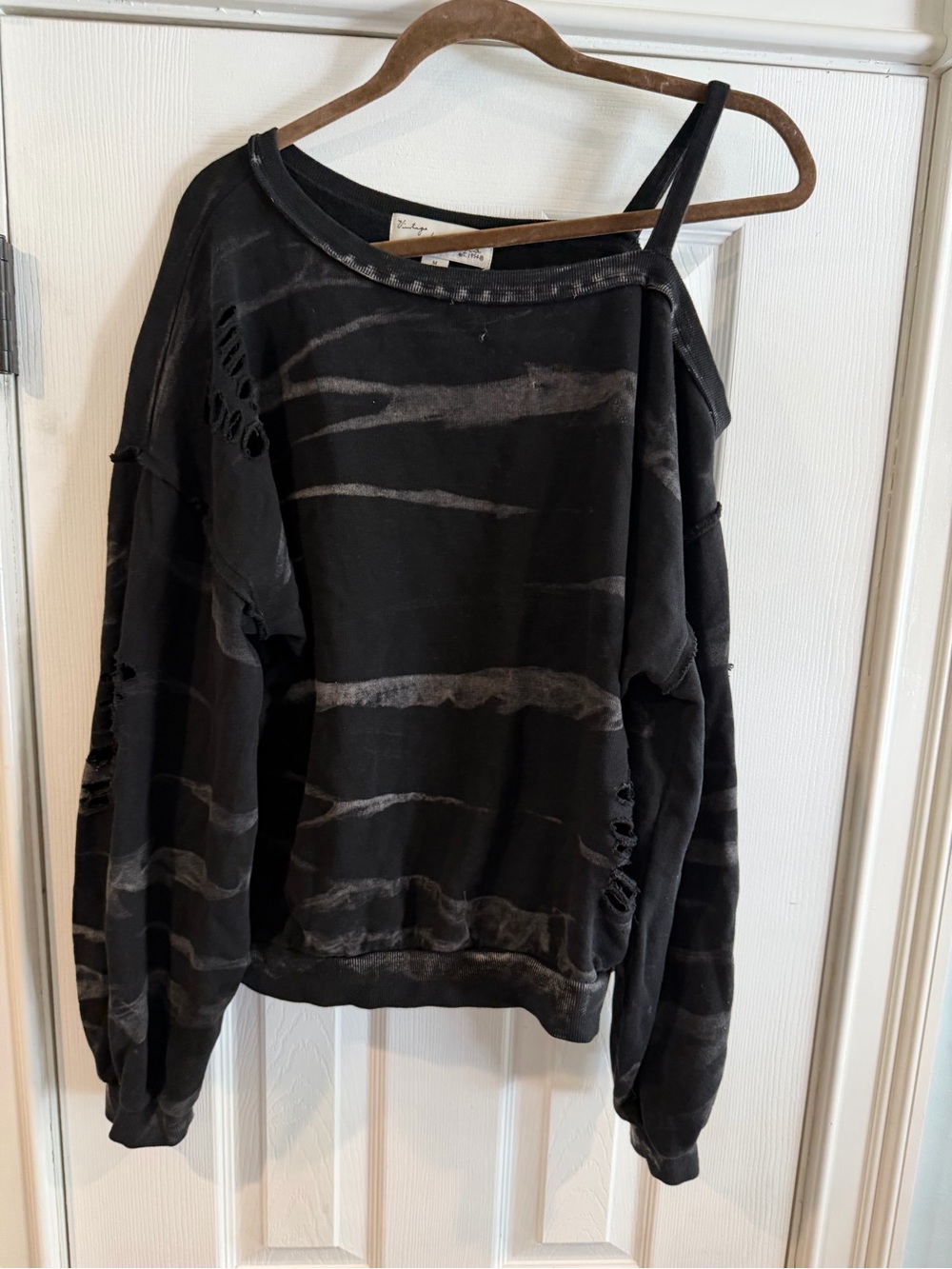 Vintage Black Distressed Off-Shoulder Sweater with Faded Stripes